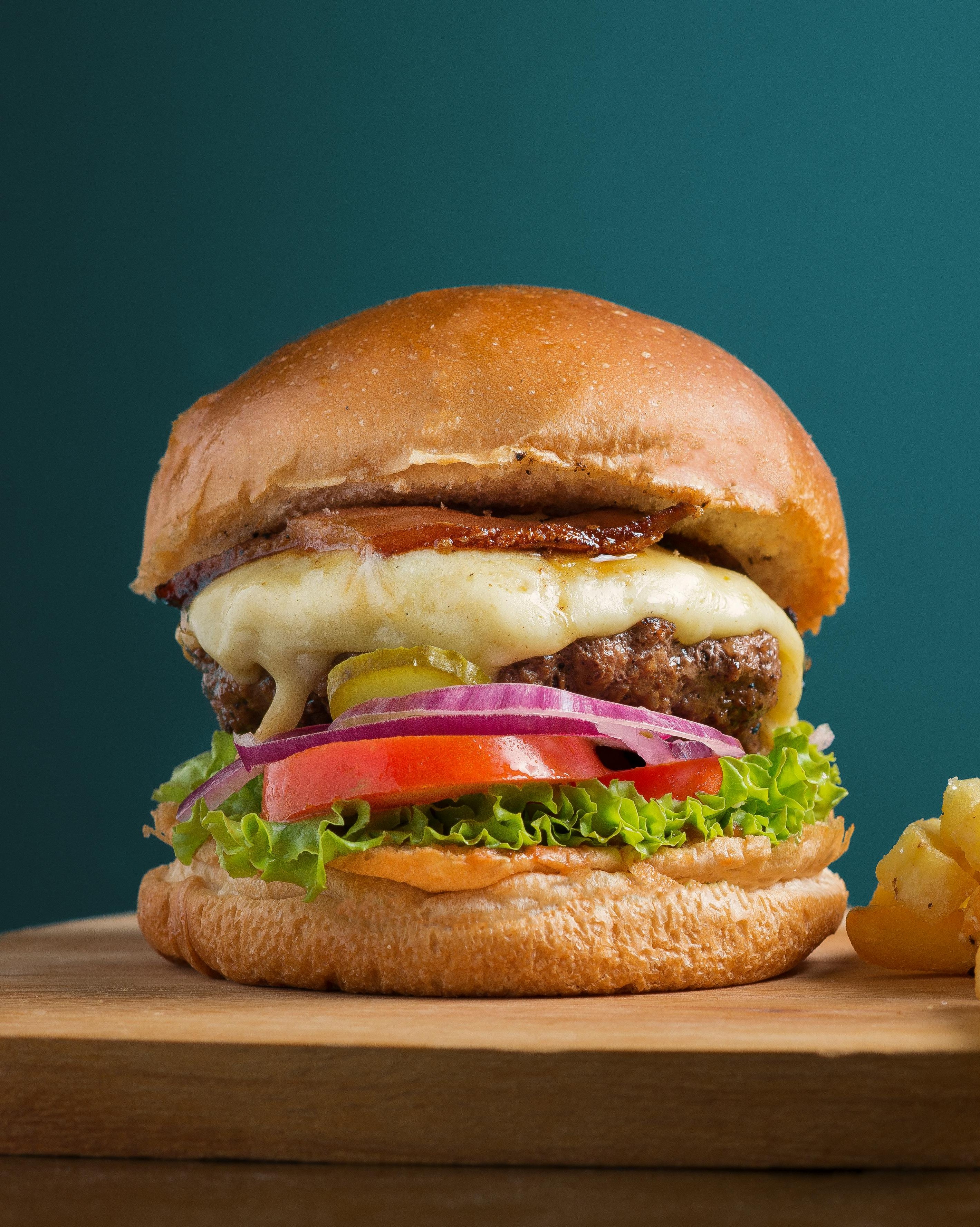 A delicious burger with toppings